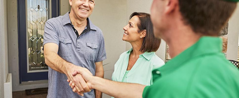 homeowner shaking hands with mover